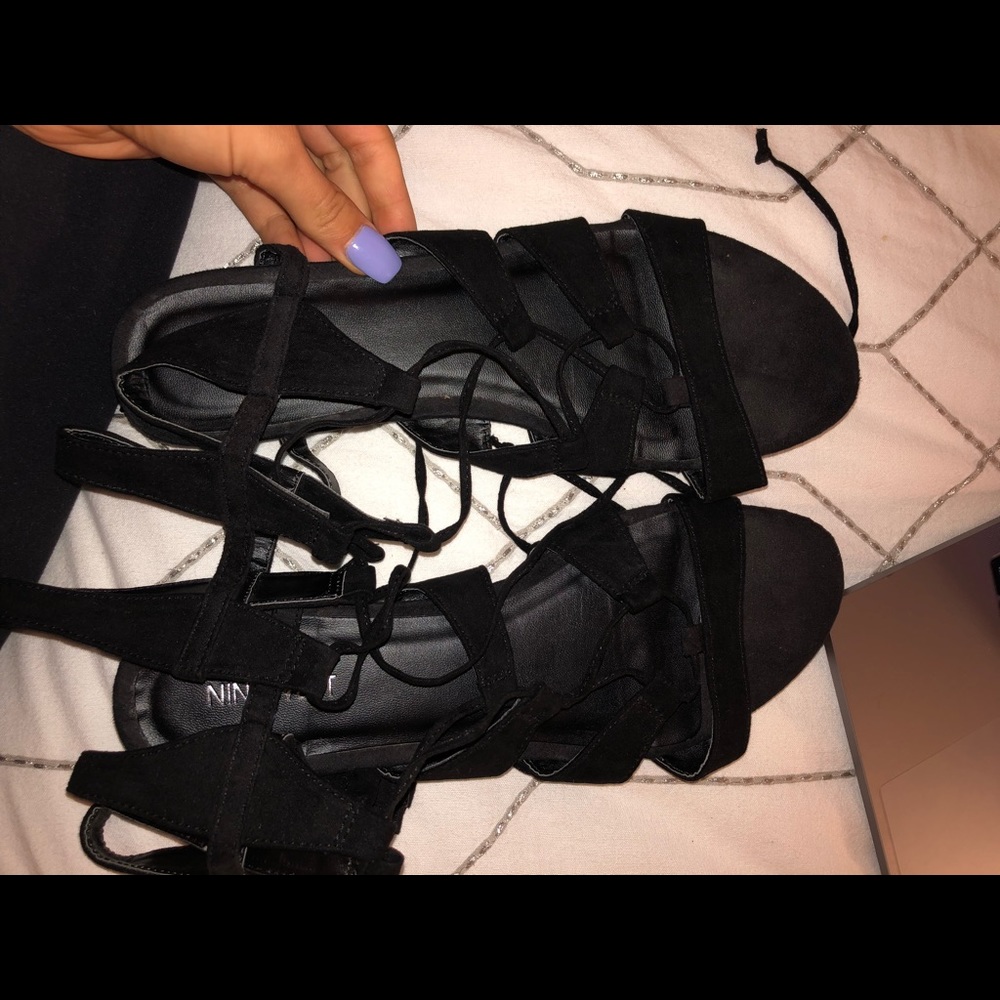 Nine West black gladiator sandals.